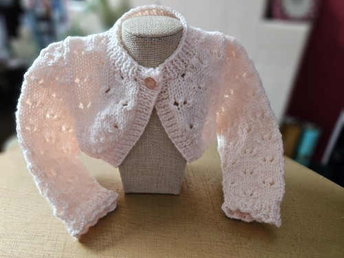 Hand knitted peach - hand,