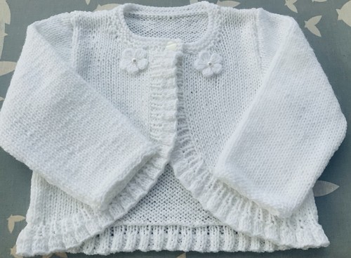 Hand knitted white frilled - knitted,