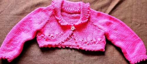 Hand knitted baby - hand,
