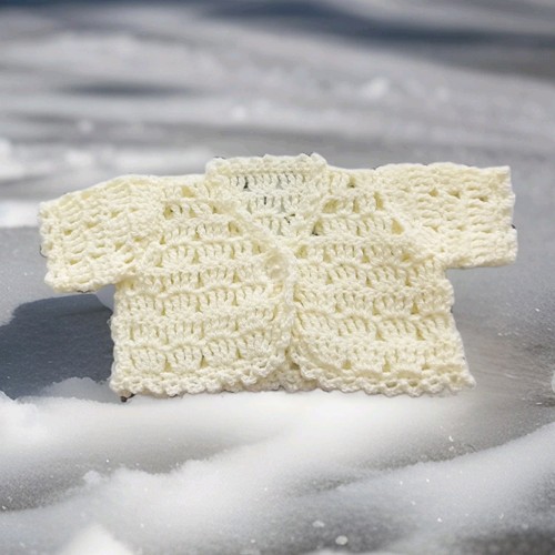 Hand crocheted baby cream - hand,